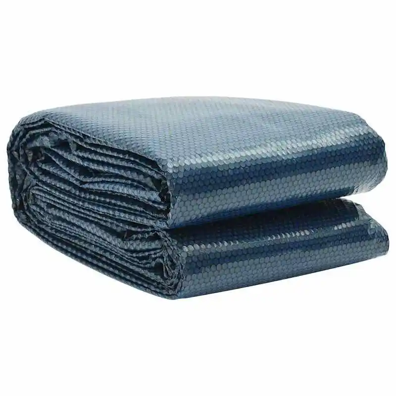 Couverture solaire à bulles noire et bleue pour piscine, pliée